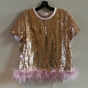 Adorable rose gold sequined top with feather detail!